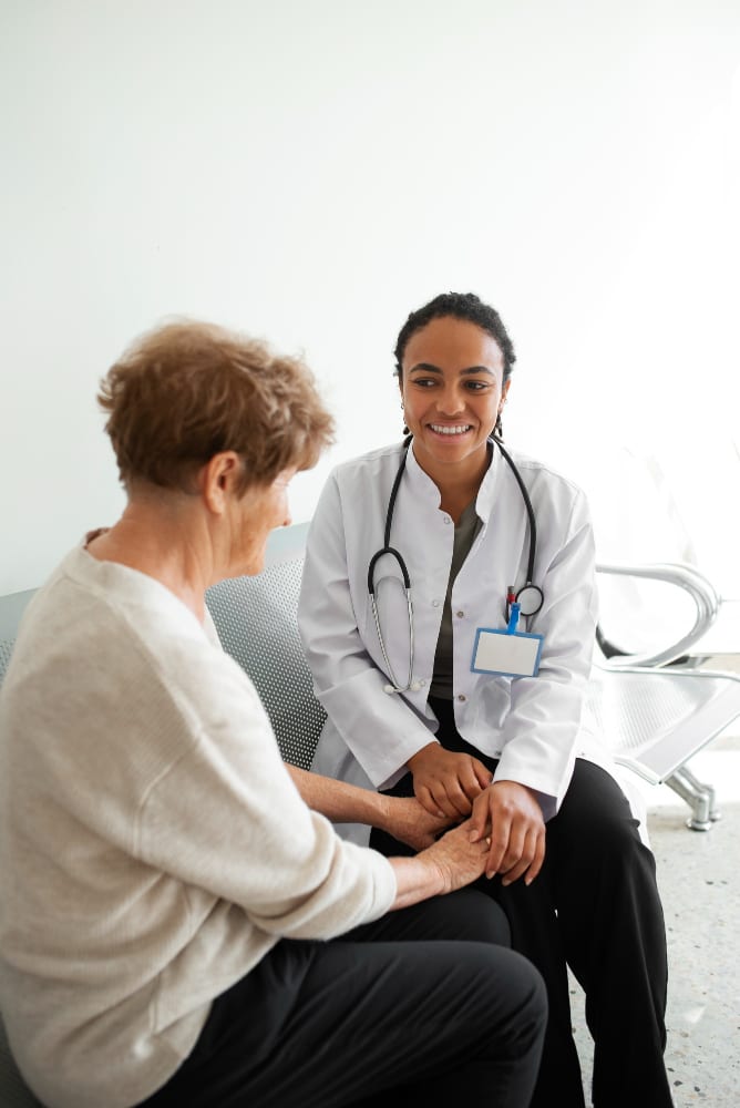Caring medical professional reviewing notes